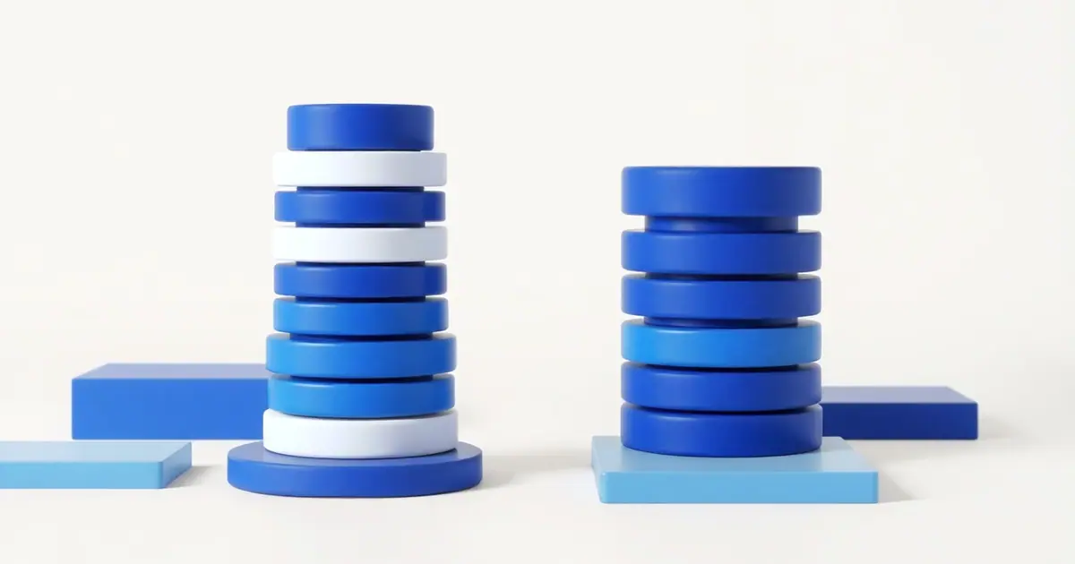Two cylinders made of stacked thin blue and white discs standing side by side, one slightly taller than the other